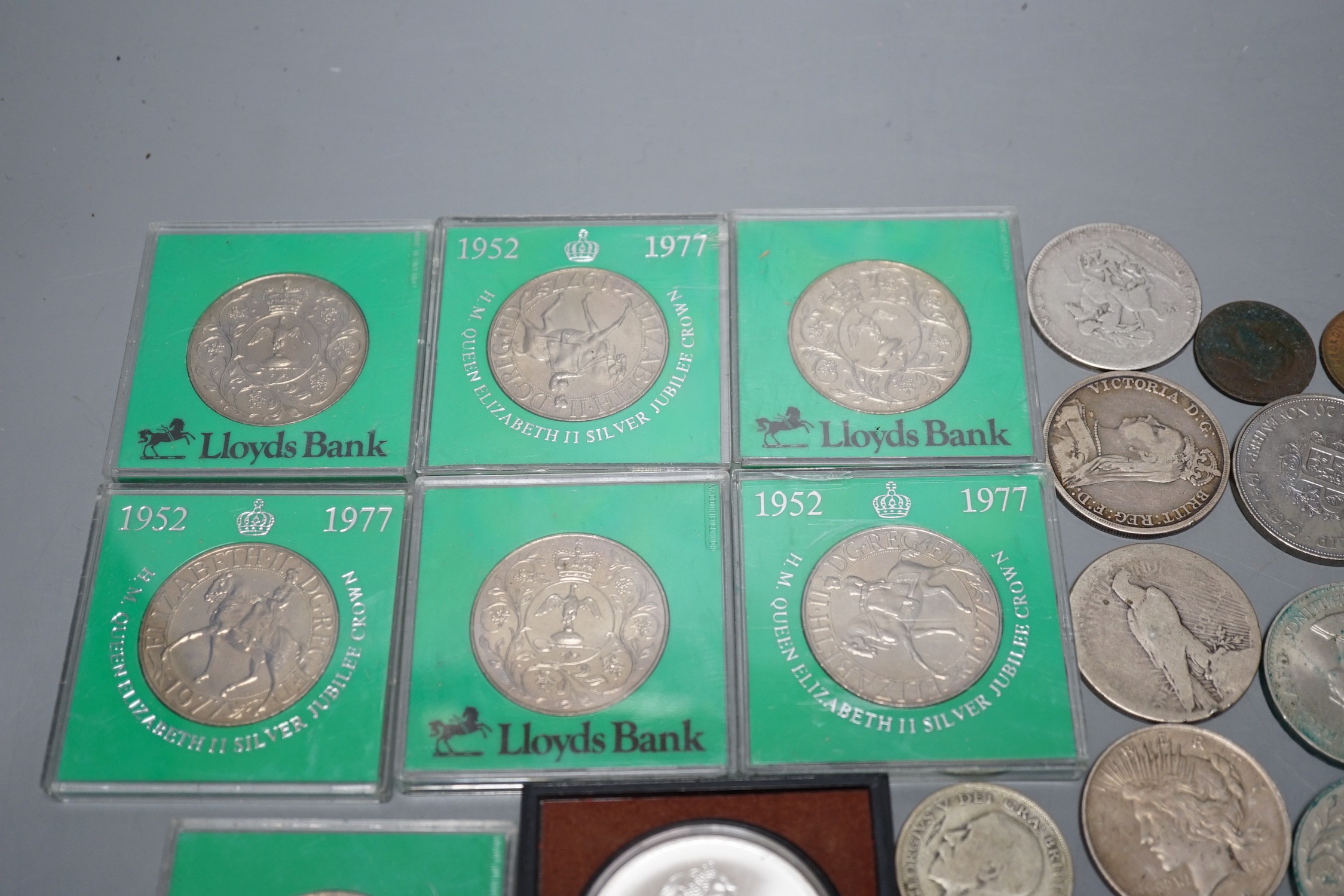 A group of mostly UK crowns and other coins, some pre-1920 silver coins and a 1976 Montréal Olympics commemorative silver coin